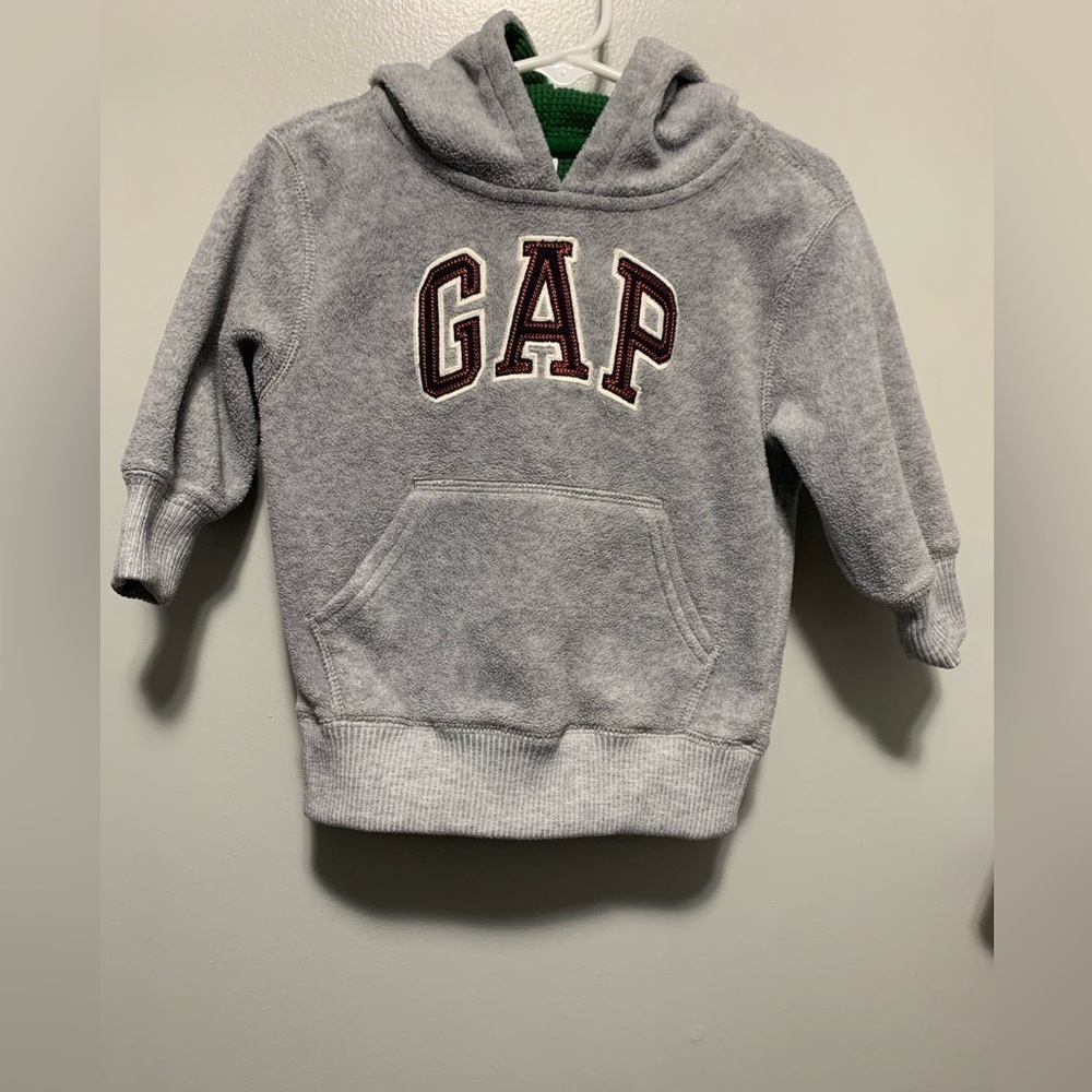 GAP 12-18 month light greyfleece hoodie, with green inside of hood.